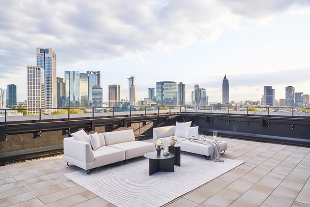 Westend Tower rooftop lounge in Frankfurt, stylish venue for upscale events and gatherings.