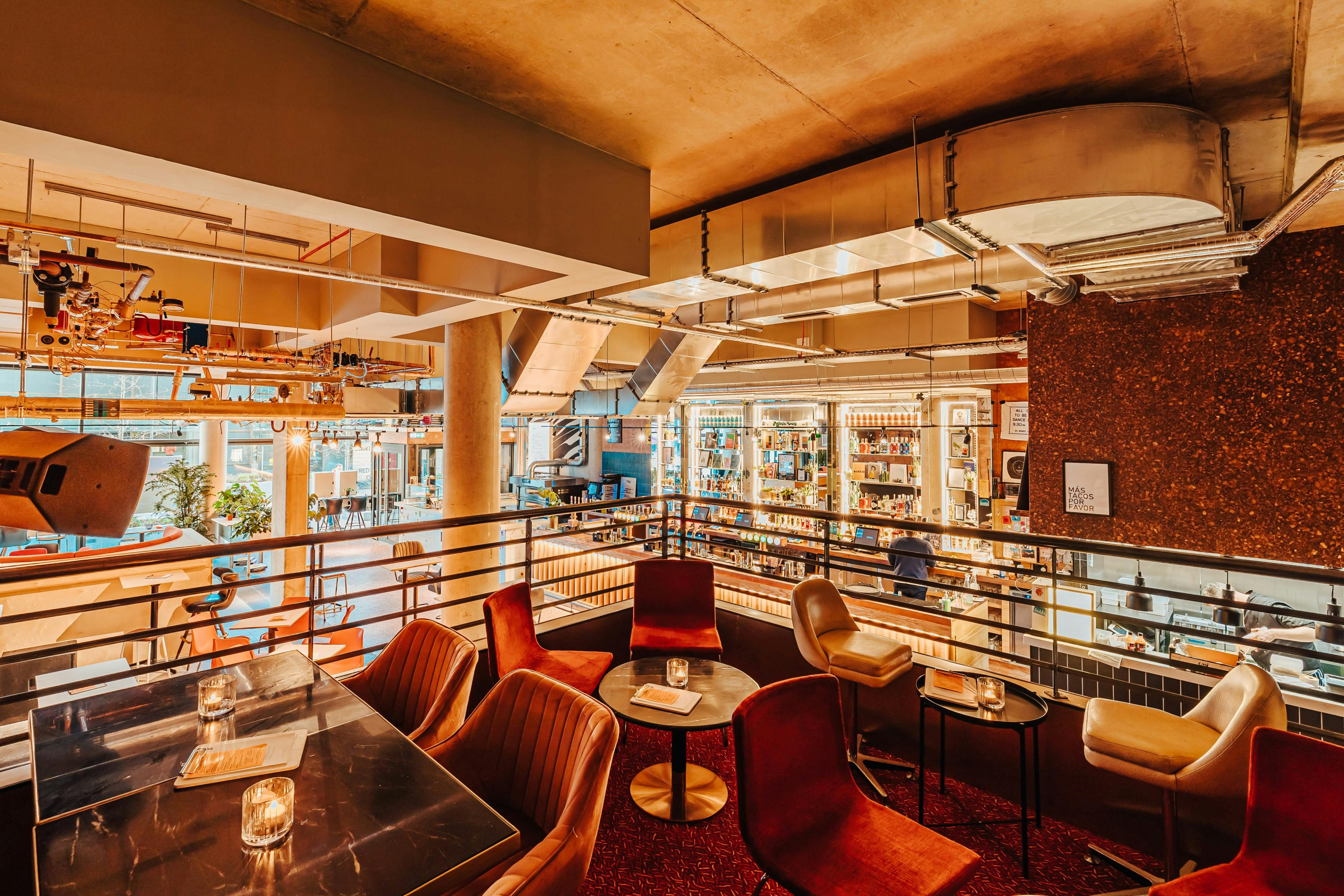 Modern Mezzanine venue with natural light for meetings and events in Someday.