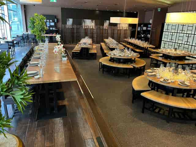Elegant dining area in Ping Pong Bow Bell's House for events and gatherings.