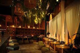 Stylish event space in Firefly City with warm lighting, ideal for networking and gatherings.