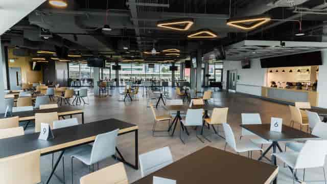 Modern event venue at Brentford FC with flexible seating for corporate events and gatherings.