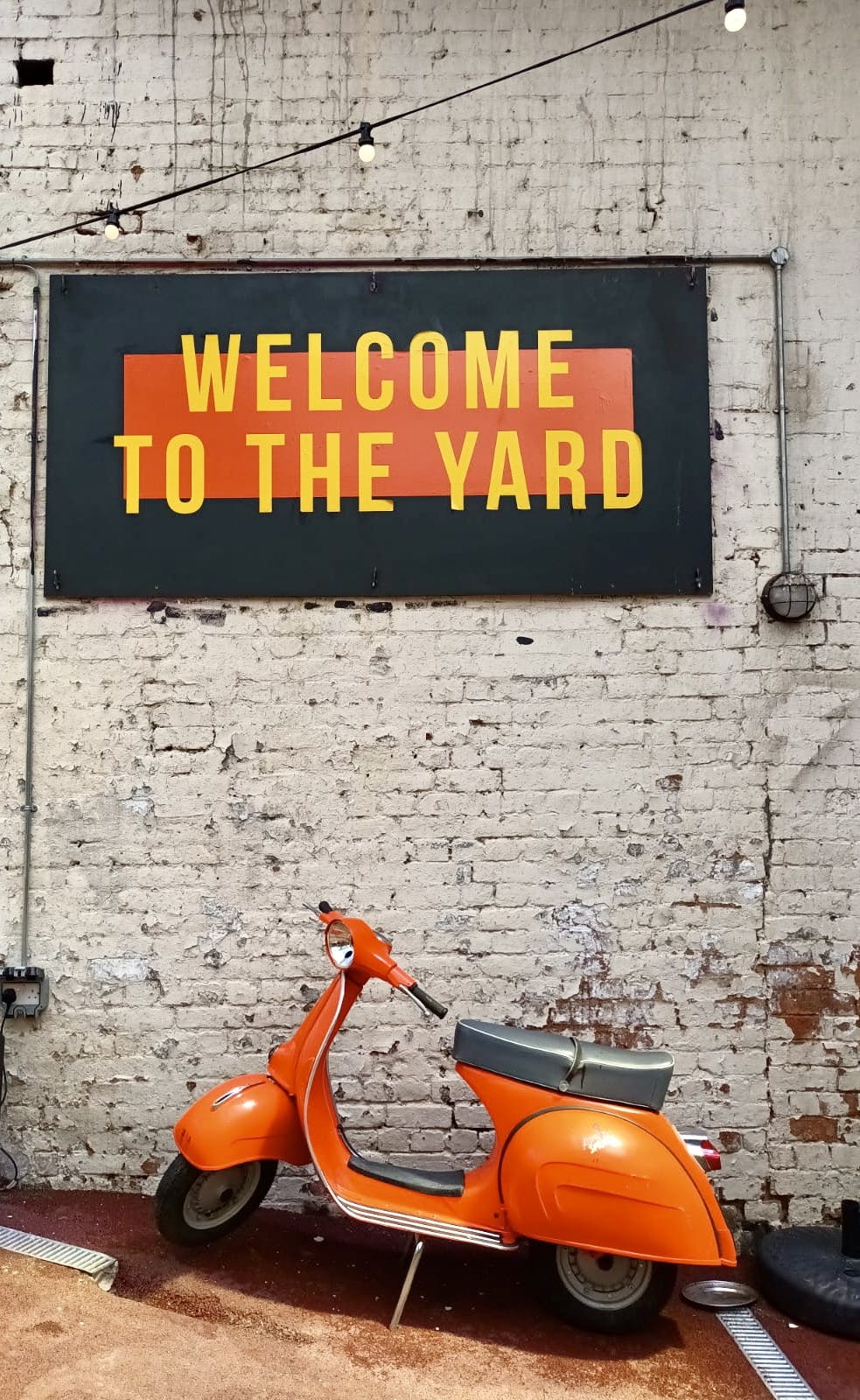 Vibrant rustic venue with exposed brick for casual gatherings and networking events.