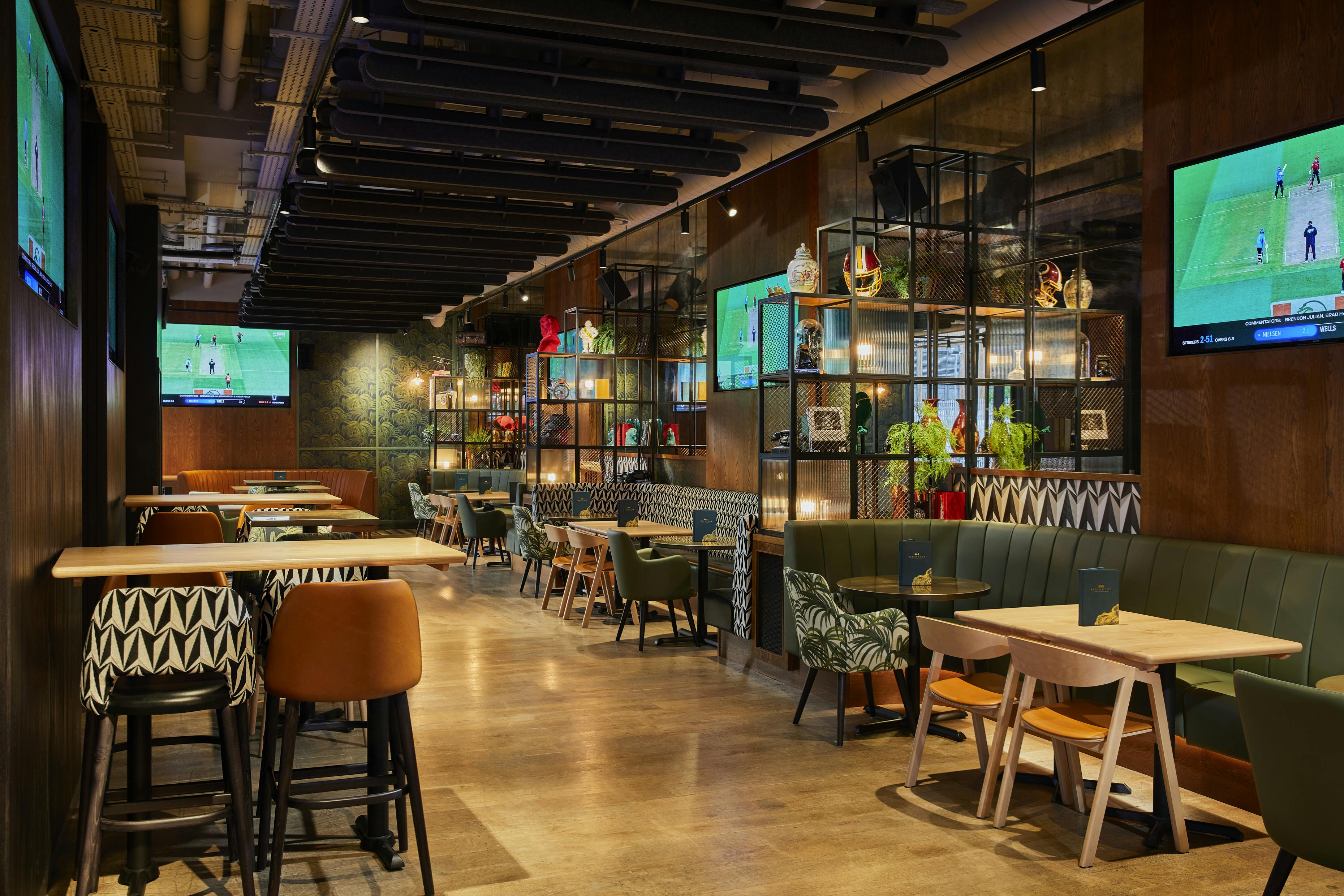 Modern Beechwood Sports Pub venue with vibrant decor for casual meetings and events.