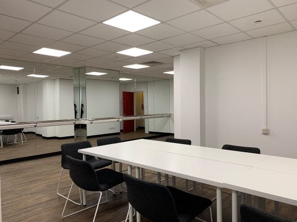 My Fair Lady Studio at Shaw Theatre: bright meeting space with long white table for workshops.