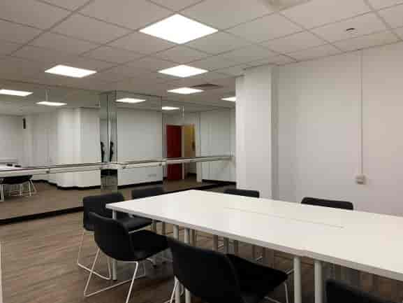 My Fair Lady Studio at Shaw Theatre: bright meeting space with long white table for workshops.