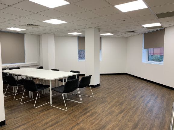 My Fair Lady Studio at Shaw Theatre: modern meeting room with large white table, ideal for workshops.