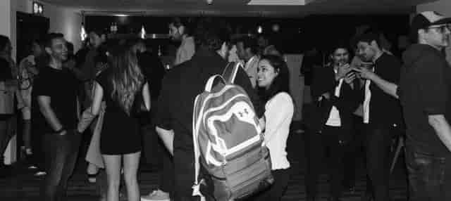 Lively networking event at Chance Street Lounge, showcasing casual attire and social interactions.