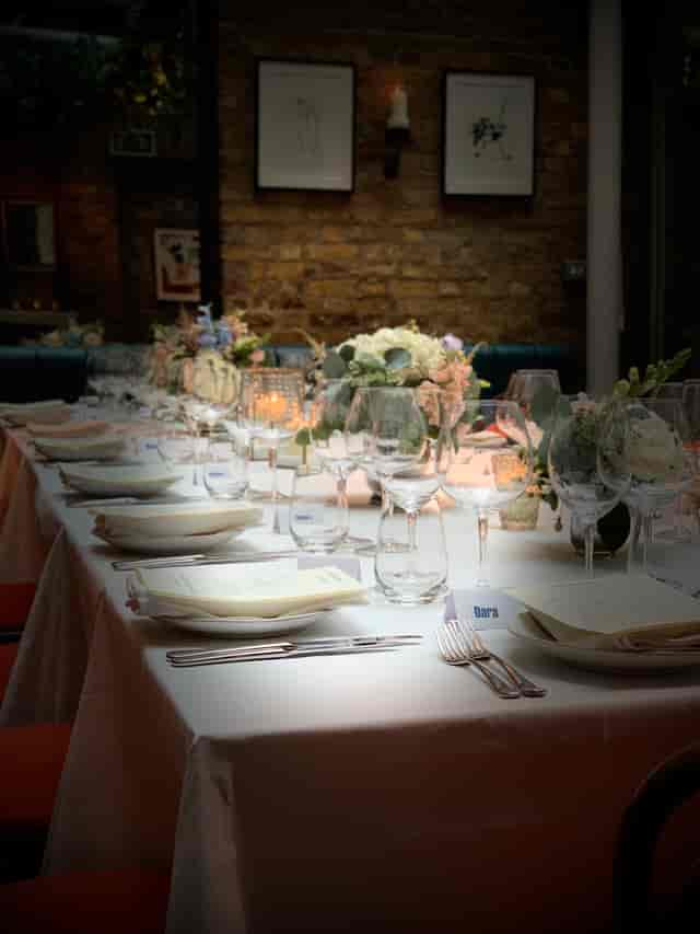Elegant dining table setup at Manicomio Chelsea for corporate events and dinners.