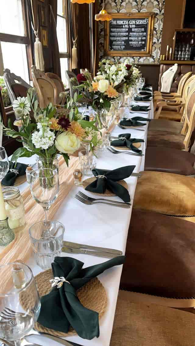 Elegant dining table in Princess Room, ideal for sophisticated events and celebrations.