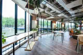 Modern event space with swing seating and natural light in Runway East Bristol.