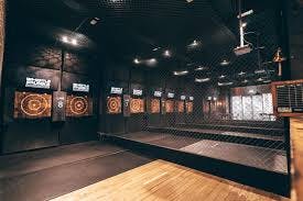 Modern indoor axe throwing venue in Bristol for team-building events and corporate outings.