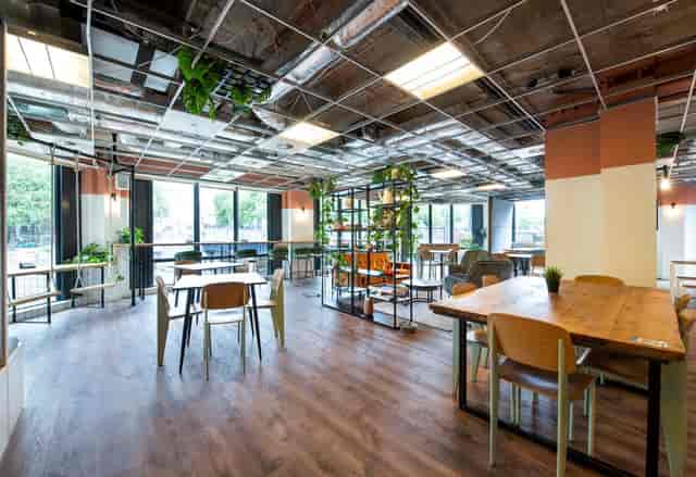 Modern event space in Runway East Bristol with natural light, ideal for meetings and workshops.