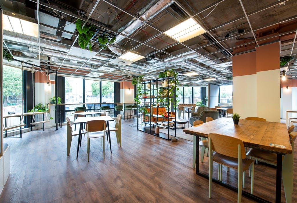 Sir George White in versatile event space with natural light, perfect for meetings and gatherings.