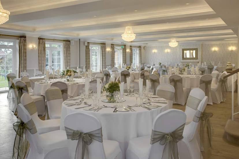 Elegant Beaulieu suite banquet hall with white linens, ideal for weddings and corporate events.