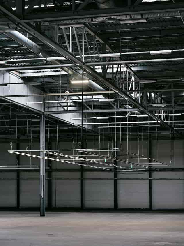 Industrial event space with high ceilings at Drumsheds, perfect for versatile setups.