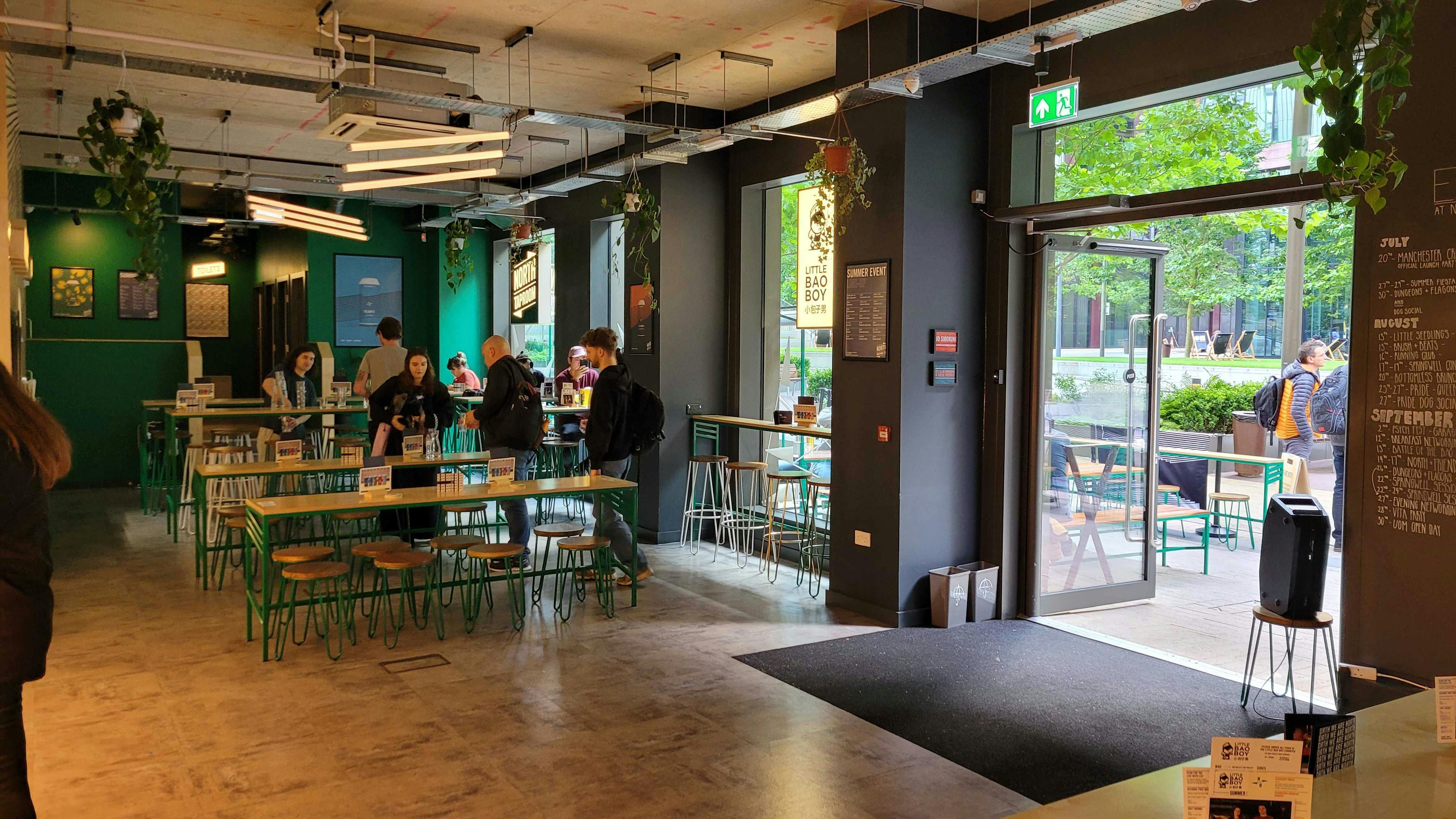 Modern Taproom venue with flexible seating for networking and workshops.