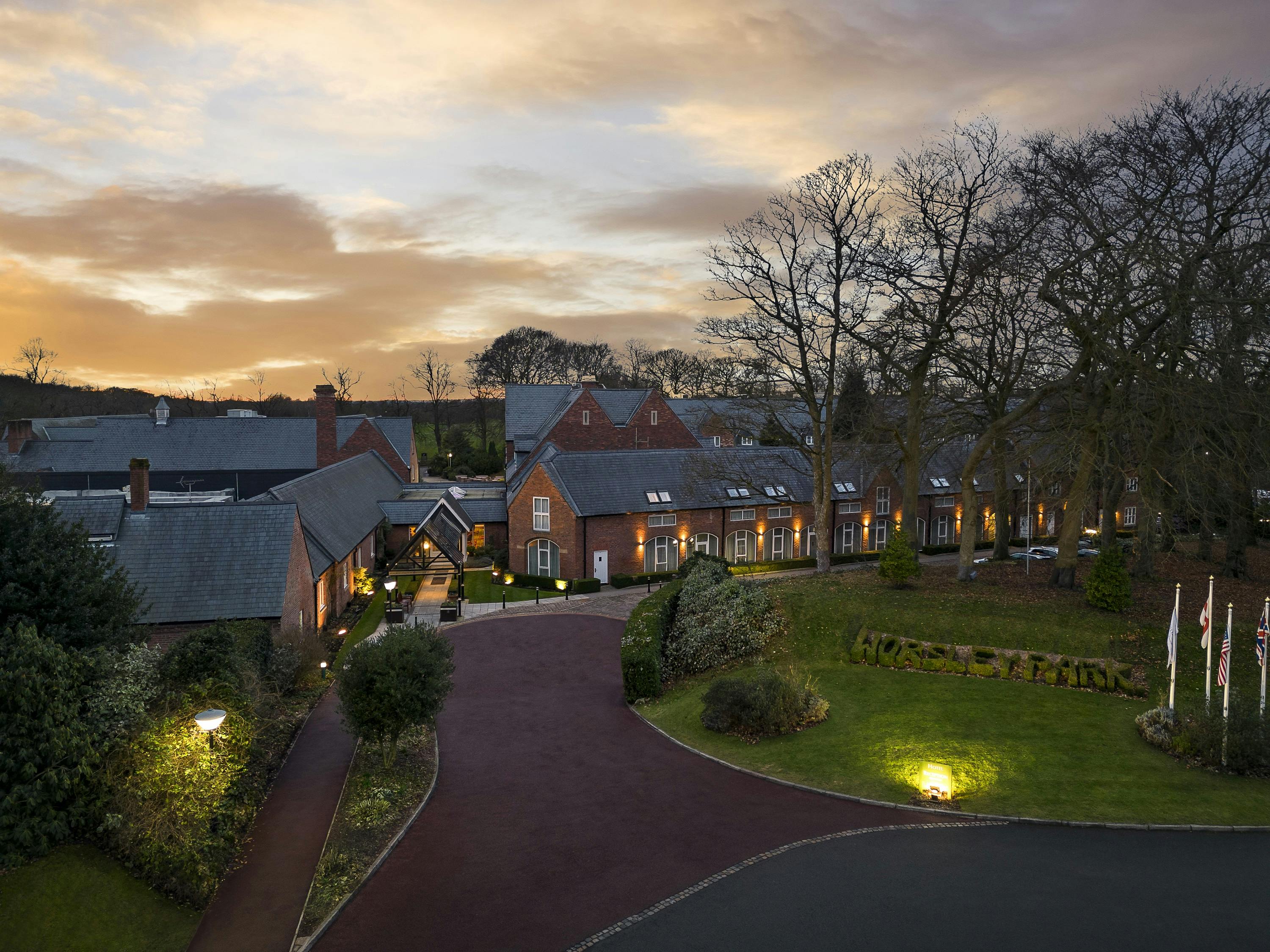 Worsley Suite at Delta Hotels, elegant venue for corporate events with sunset backdrop.