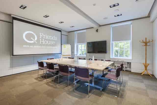 Hilda Clark Suite meeting room with large table, ideal for workshops and strategic planning.