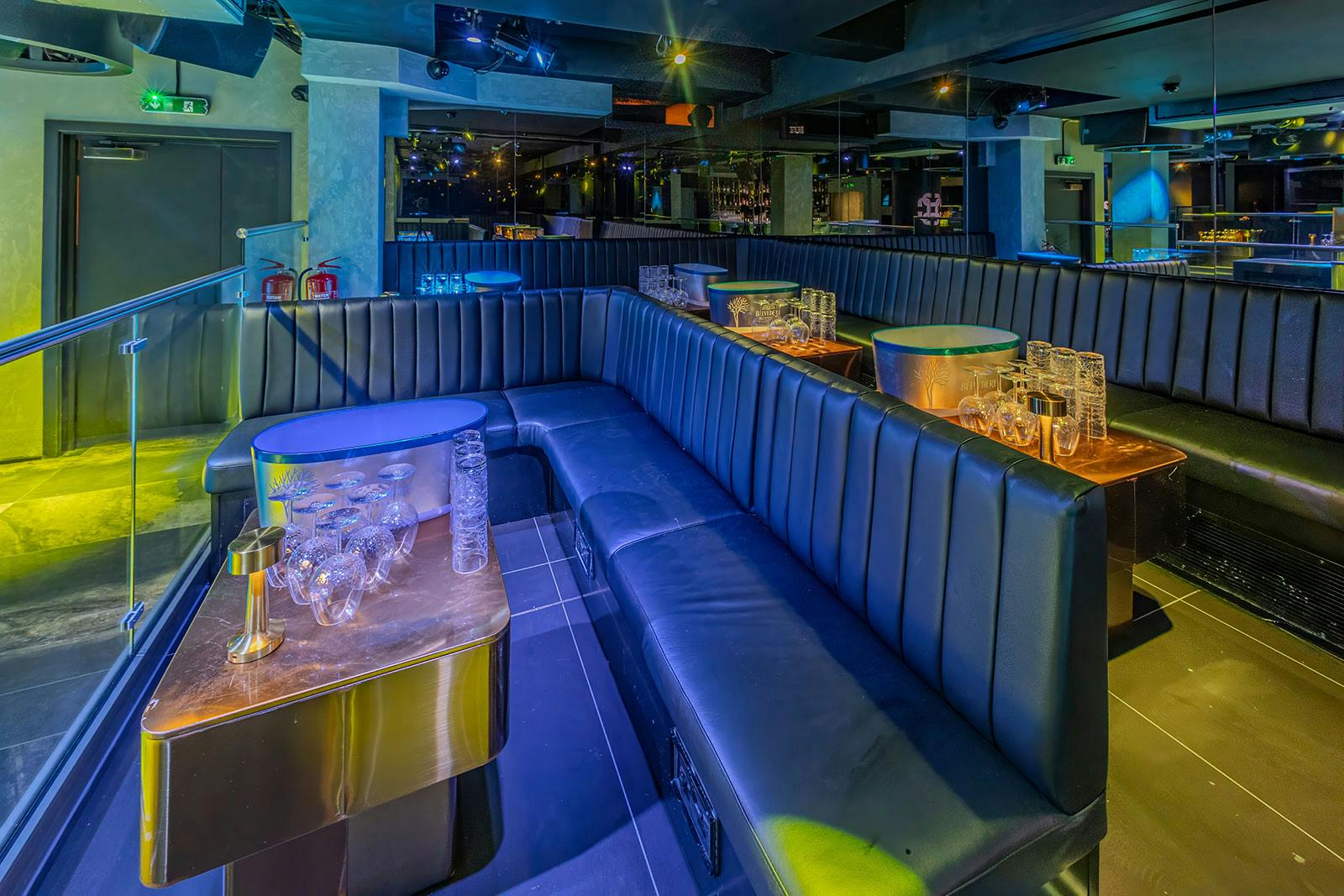 Sleek lounge area with plush seating for networking events and private parties.