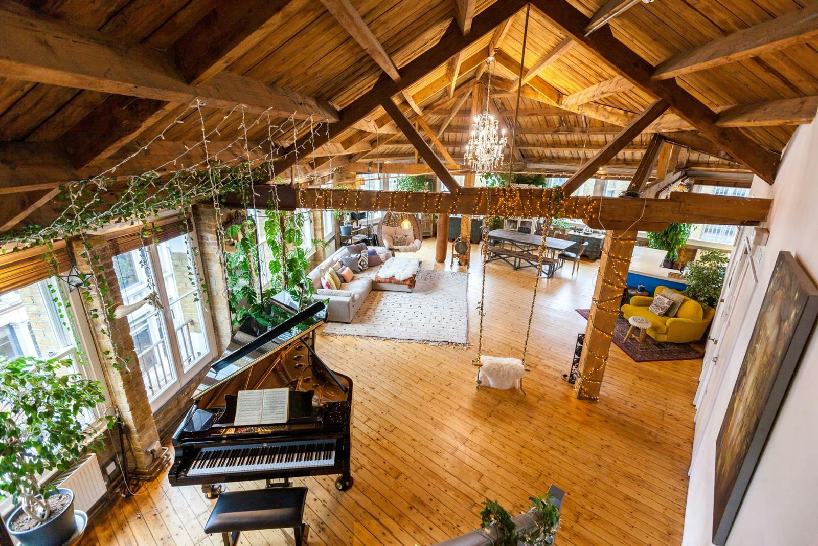 Spacious Shoreditch Treehouse venue with grand piano for intimate events and workshops.