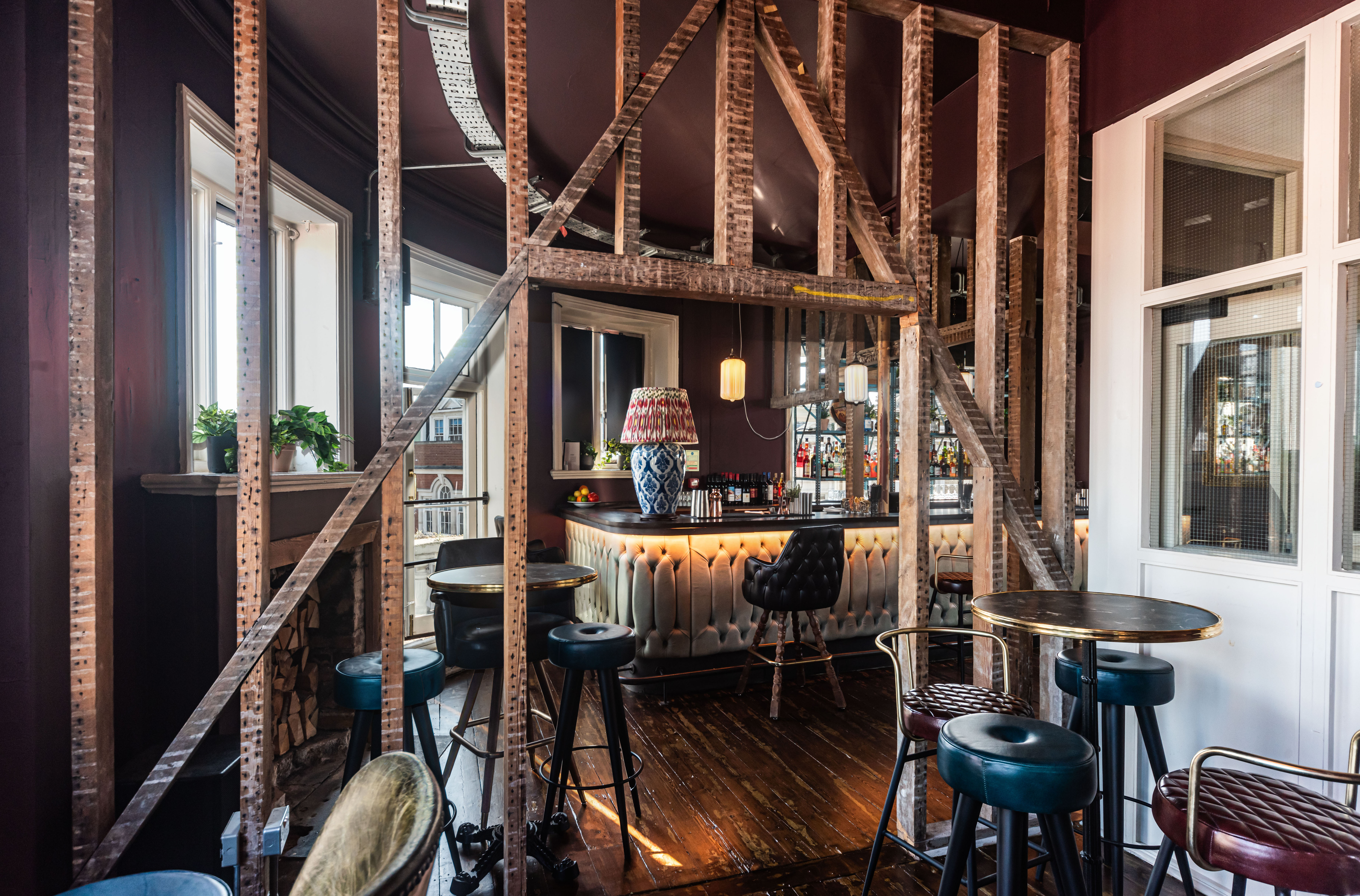 Stylish bar area with rustic design, perfect for networking events at The Railway.