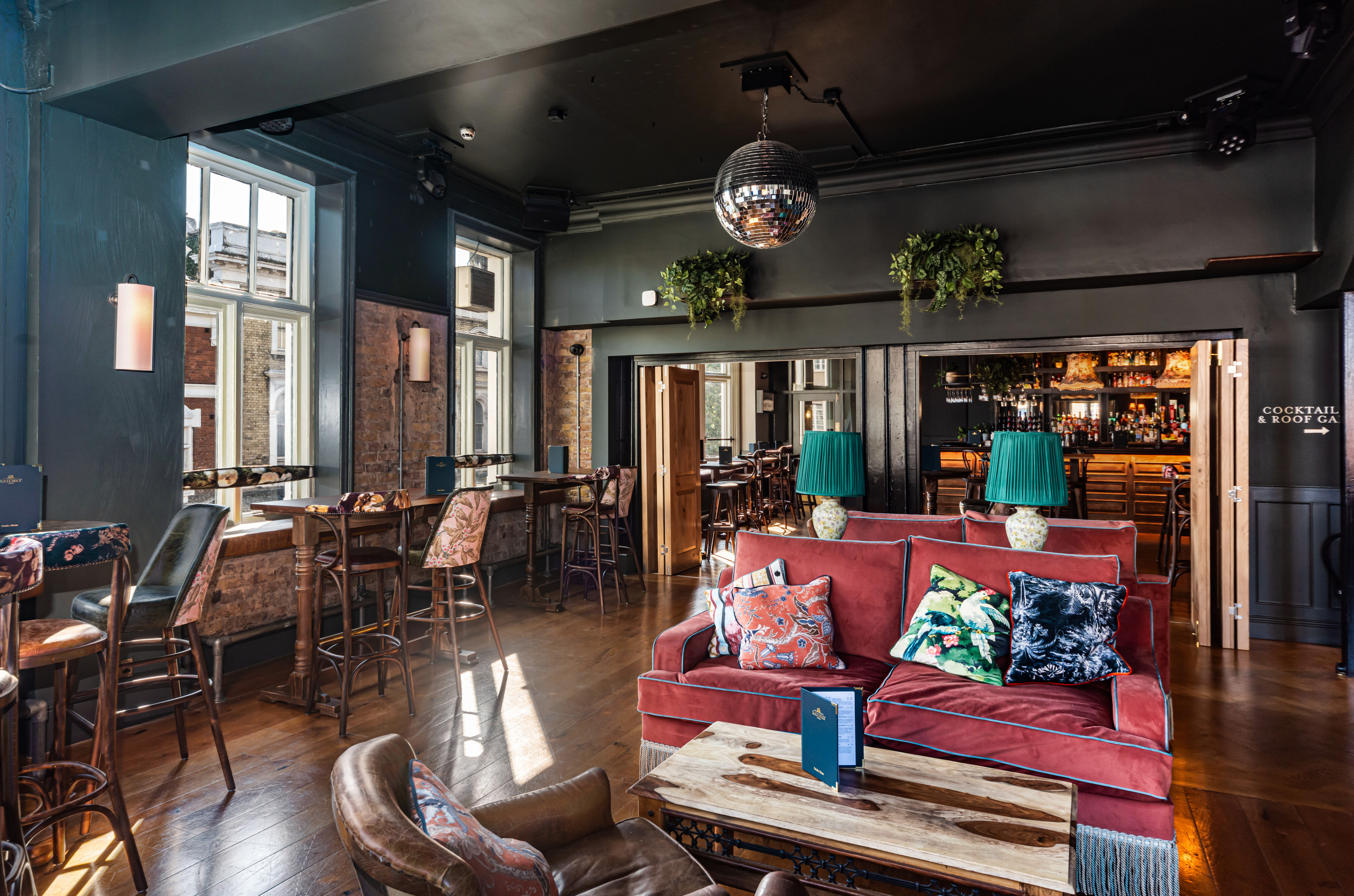 Stylish event space at The Railway with modern decor, perfect for gatherings and meetings.