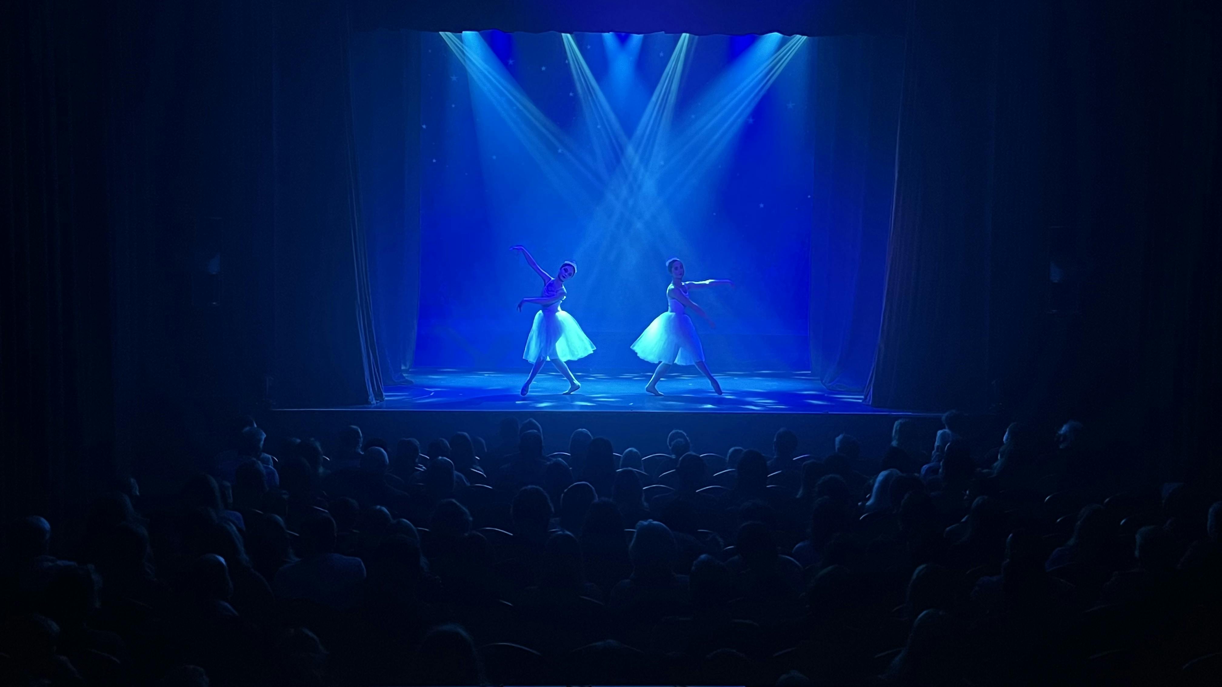 Esher Theatre stage performance with dancers in tutus, ideal for gala events.