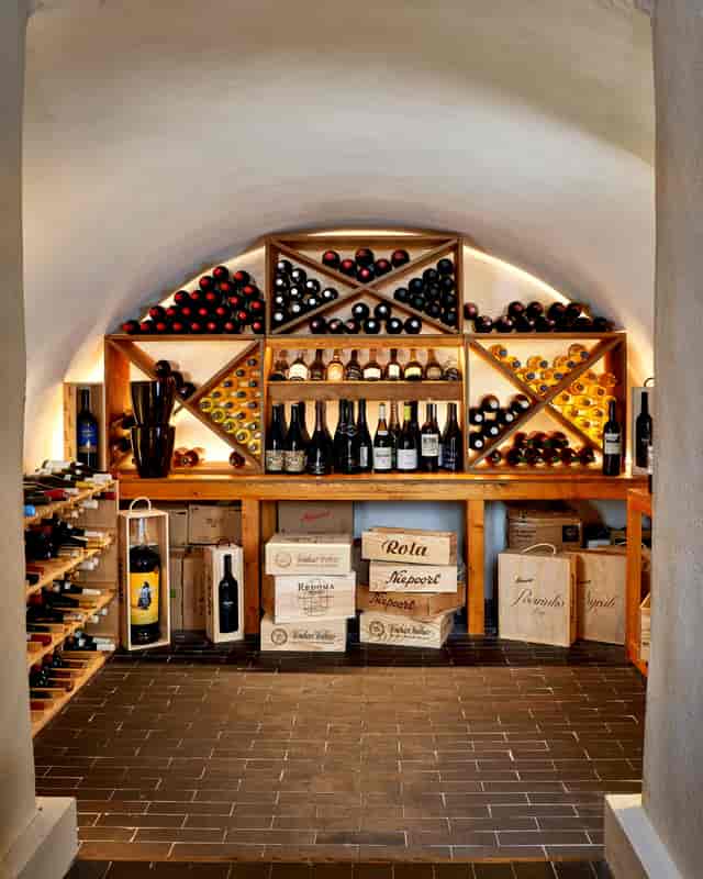 "Elegant wine cellar in Adega Private Dining Room for intimate tastings and upscale events."