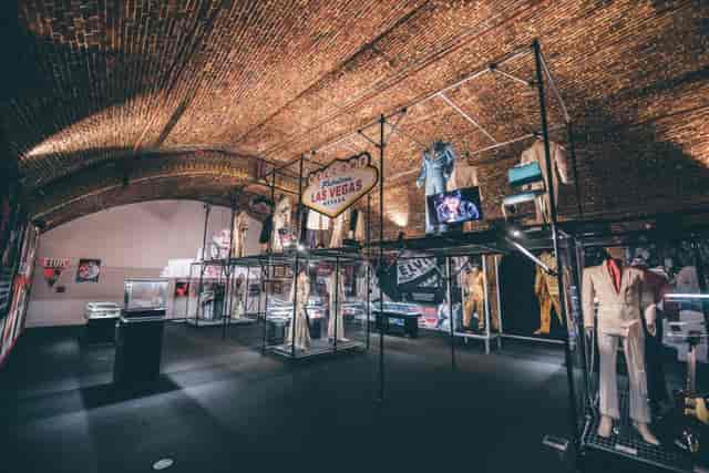 Vintage attire exhibition in unique Arches venue at London Bridge, ideal for events.