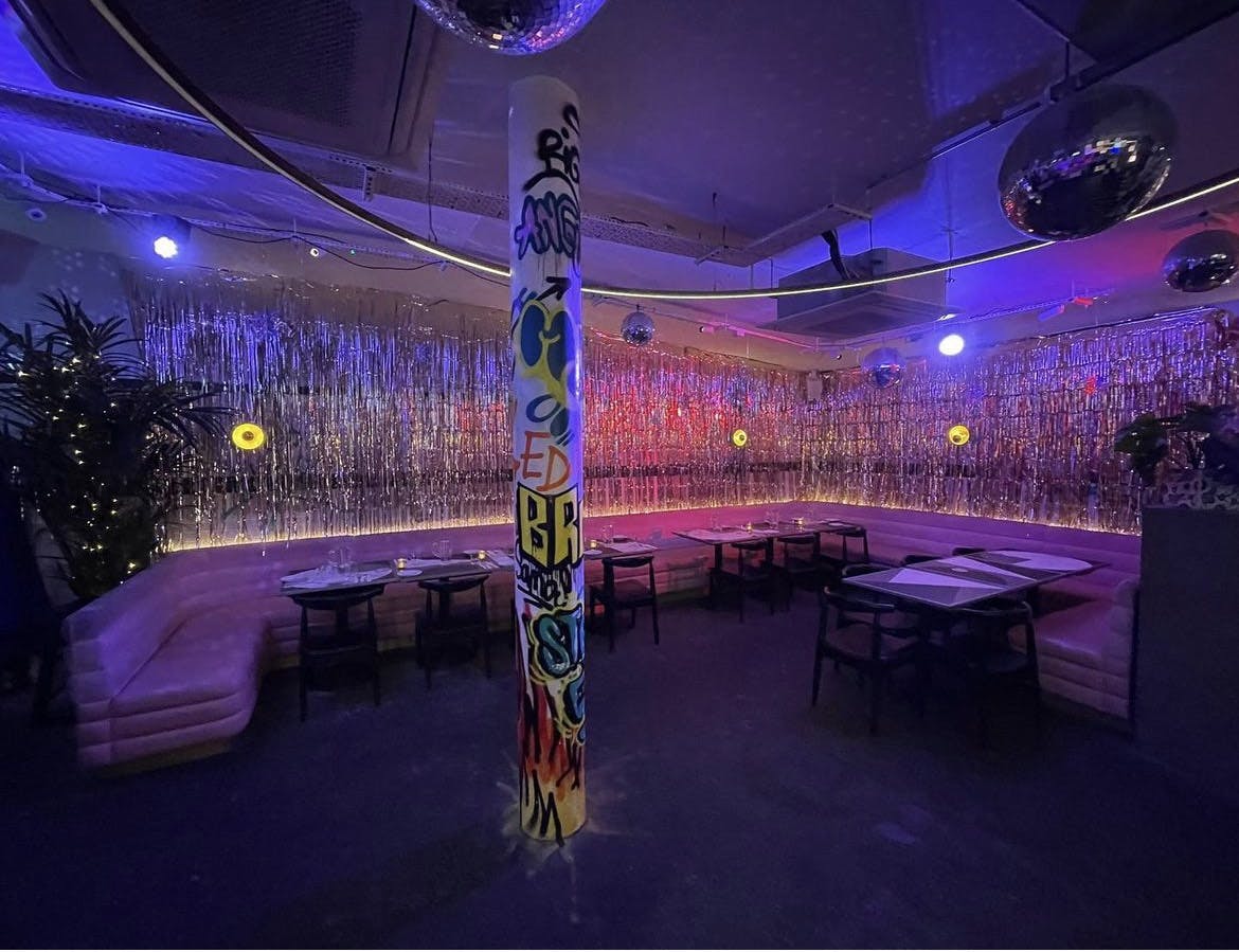 Vibrant event space at Le Bab with eclectic decor, perfect for creative gatherings.