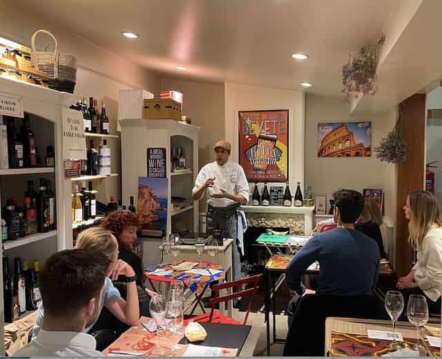 Intimate culinary event in Egro' London with chef demonstration and cozy ambiance.