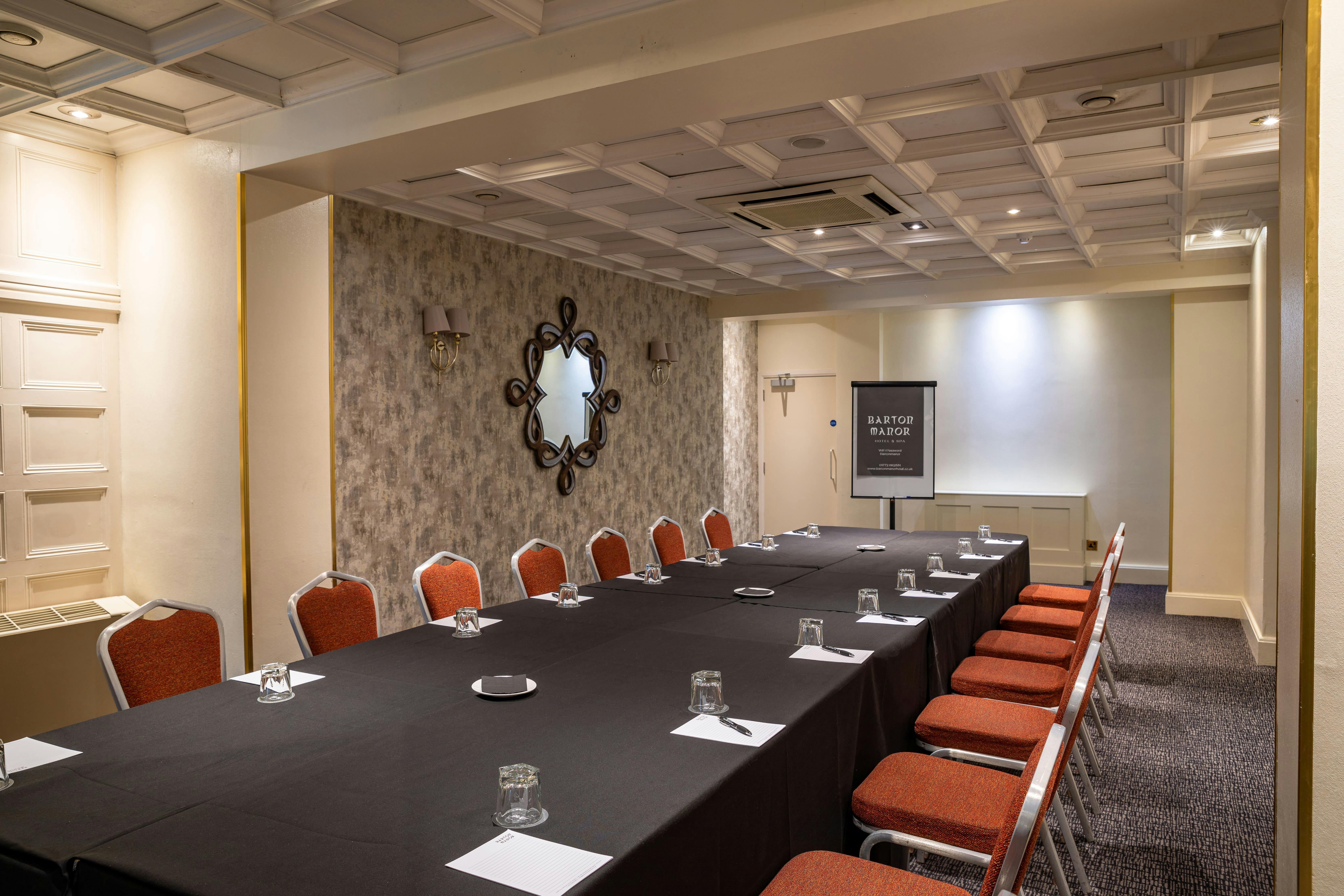 Manor room at Barton Manor Hotel, elegant meeting space for conferences and workshops.