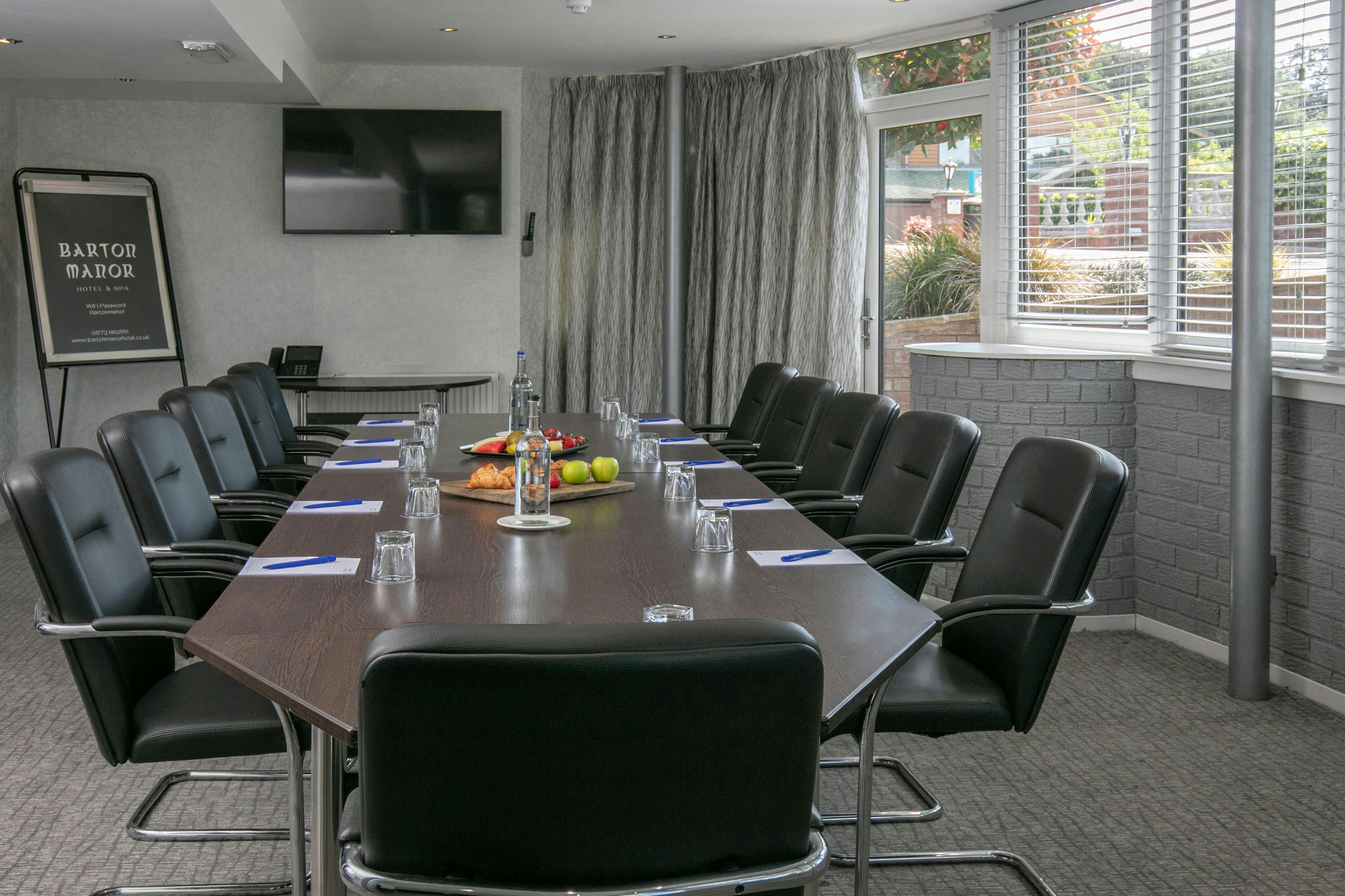 Genius Room at Barton Manor: modern meeting space with natural light for professional events.