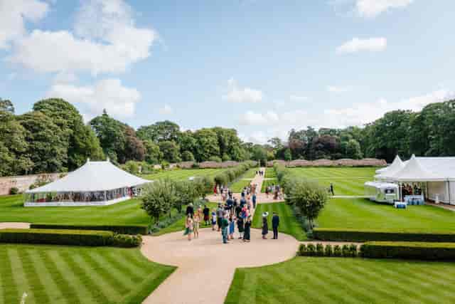 Georgian Walled Garden at Yester Estate with elegant white tents for outdoor events.