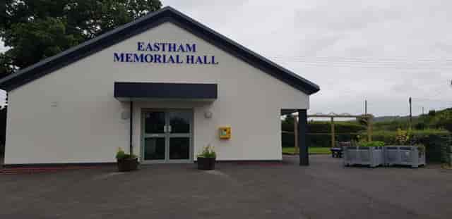 Eastham Memorial Hall exterior, ideal venue for events, surrounded by greenery.