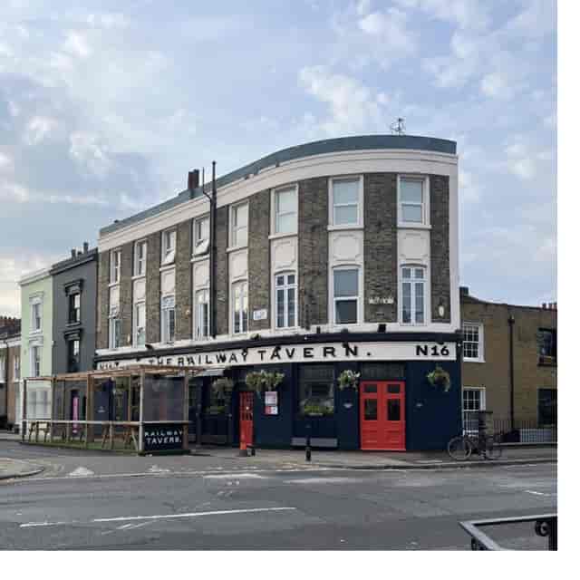 Charming Railway Tavern N16 with outdoor seating, perfect for casual events and gatherings.