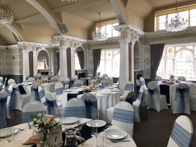Elegant Lord Trent Suite with round tables, ideal for weddings and formal events.