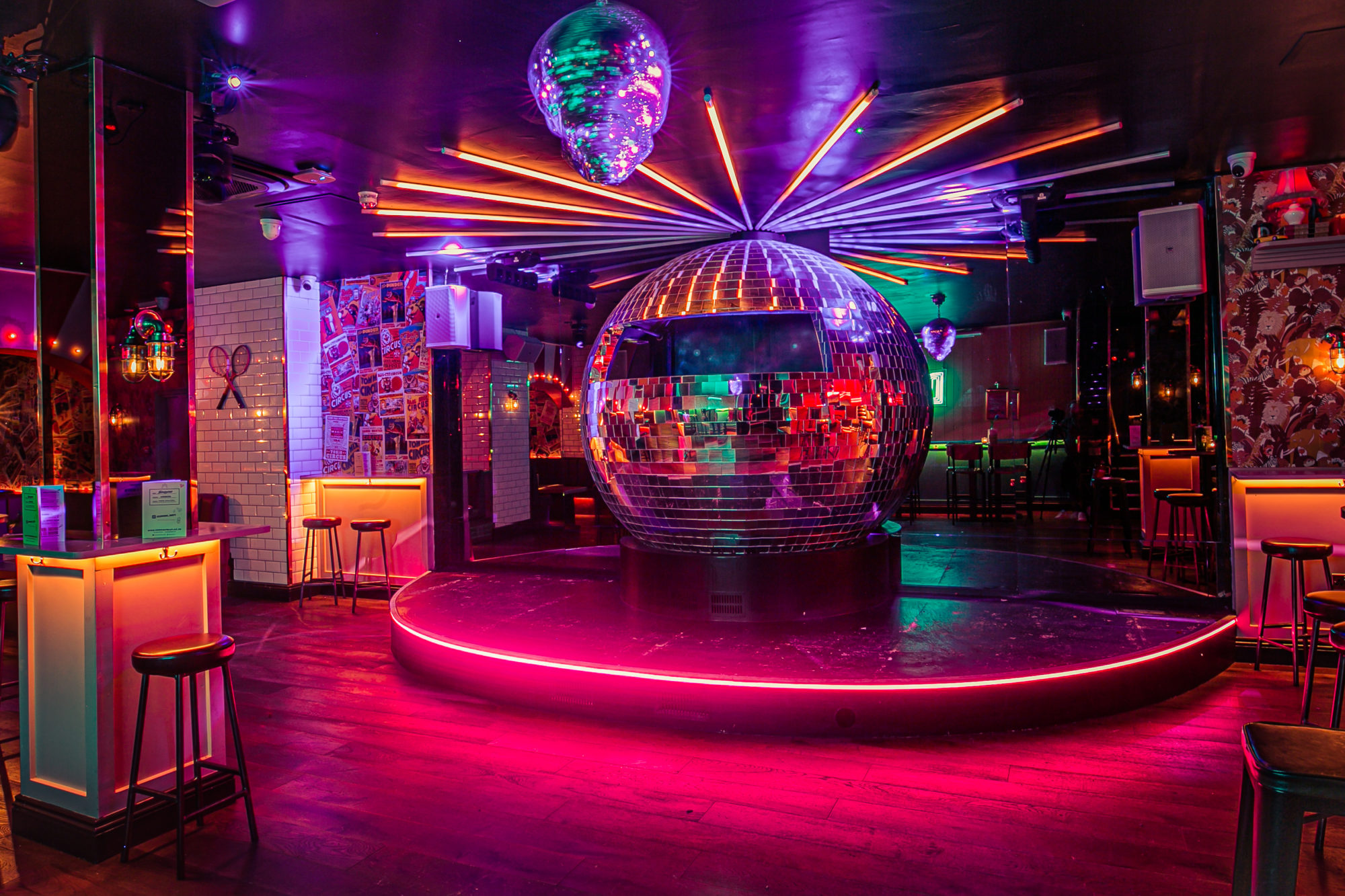 Vibrant event space in Simmons Holborn with disco ball, perfect for parties and gatherings.