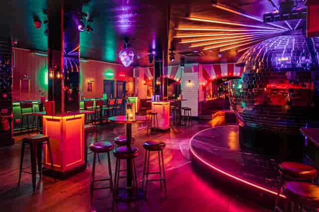 Vibrant Simmons | Holborn function room with disco ball for themed parties and celebrations.