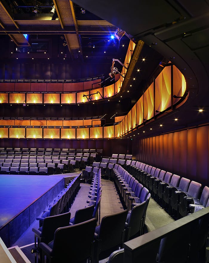 Modern Sohoplace auditorium with tiered seating for performances and corporate events.