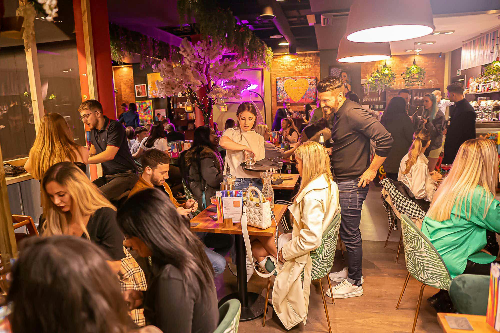 Vibrant venue with colorful decor, perfect for networking events and social gatherings.
