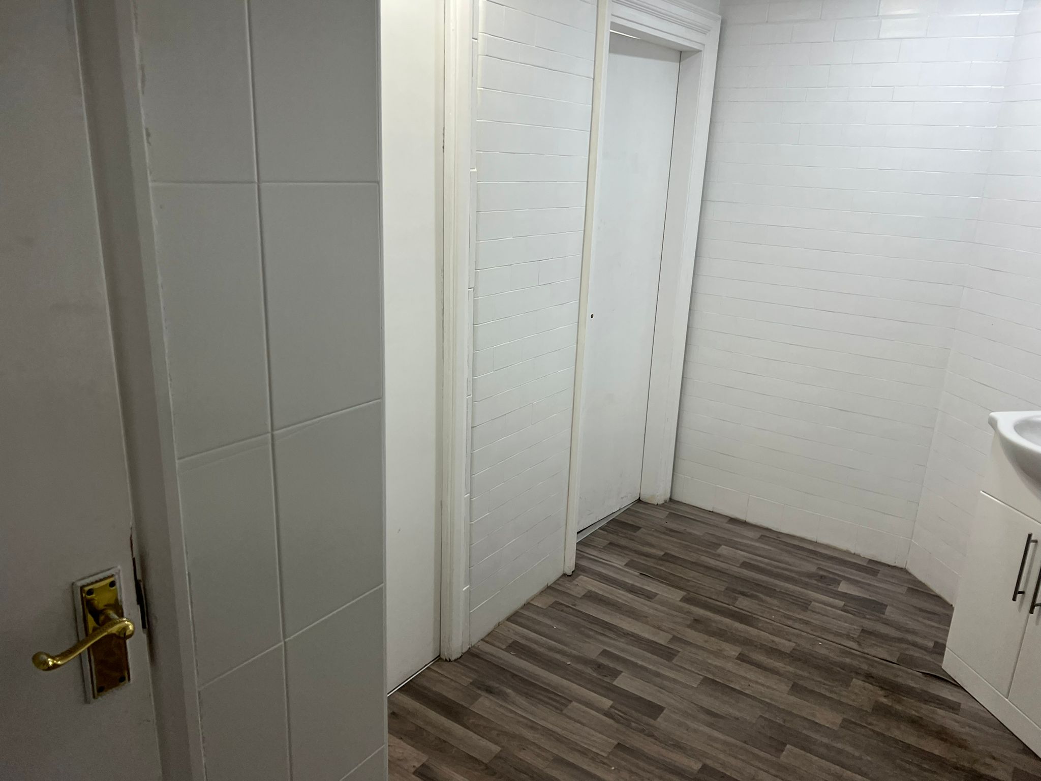 Minimalist restroom in The Unit, featuring modern finishes for events and meetings.