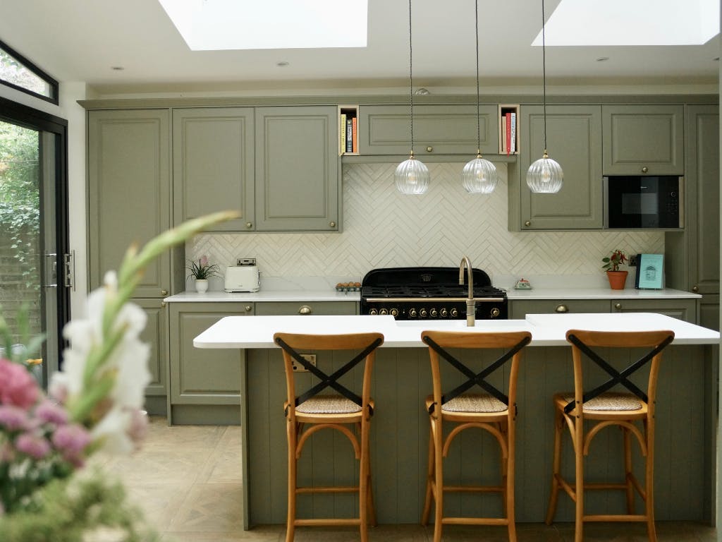 Modern kitchen with spacious island, perfect for gatherings and cooking events in Primrose Hill.