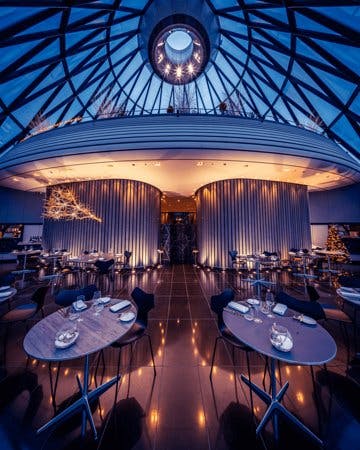 New Year's Eve event space at Searcys, Gherkin with elegant lighting and seating.