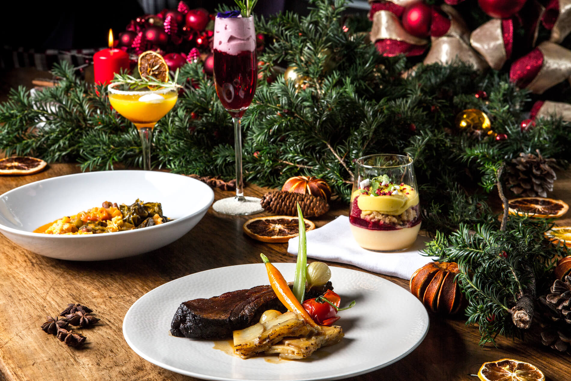 New Year's Eve dining setup at Searcys, featuring gourmet dishes and festive decor. - Banner