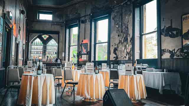 Elegant event space with rustic charm, ideal for weddings and gatherings.