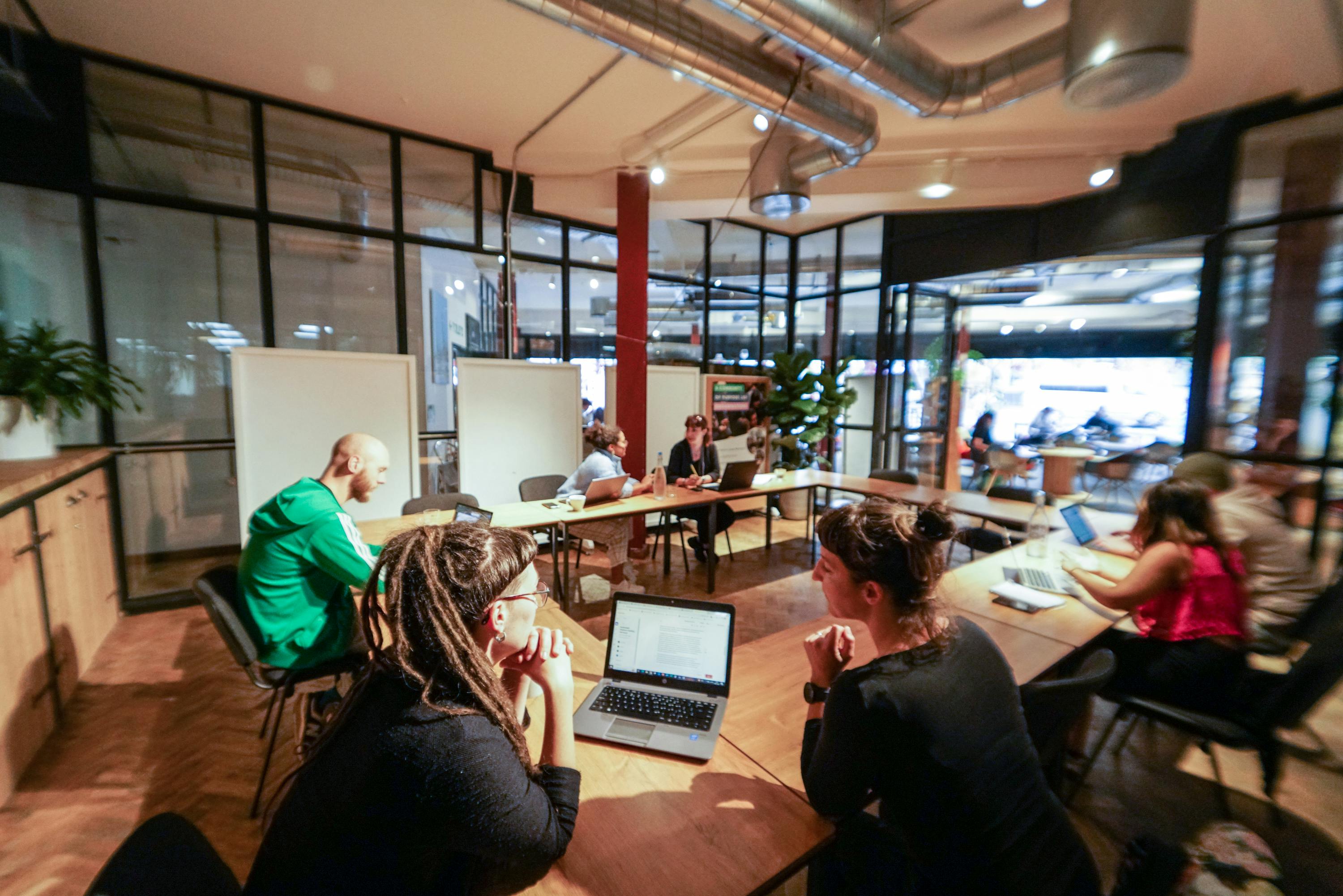 Collaborative meeting space with natural light for workshops and strategy sessions.