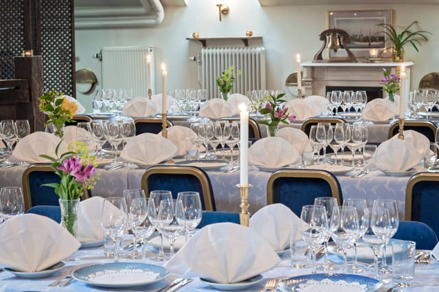 Elegant dining setup in Strömsalongen, Sjofartshuset for formal events and celebrations.
