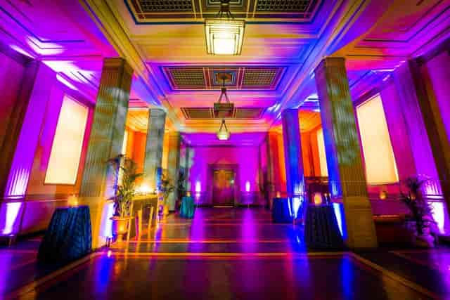 The Gallery Suite at Freemasons' Hall, elegant event space with vibrant lighting.