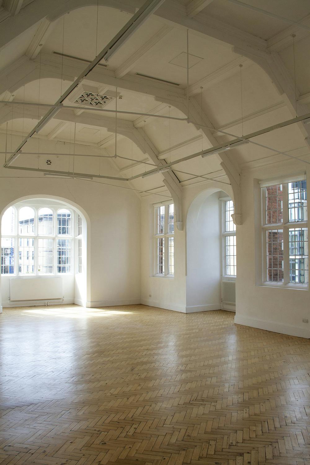 Bright, spacious Camden Art Centre event space with large windows for workshops and networking.